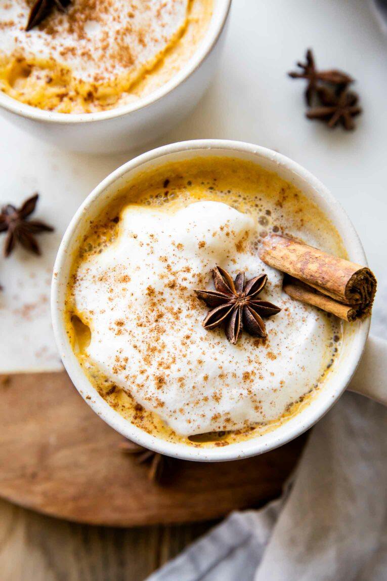 pumpkin spice chai latte with cinnamon sticks and star anise