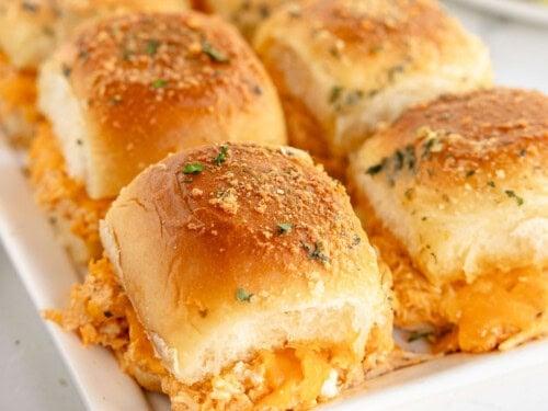 empty platter with a few crumbs, indicating vanished buffalo chicken sliders