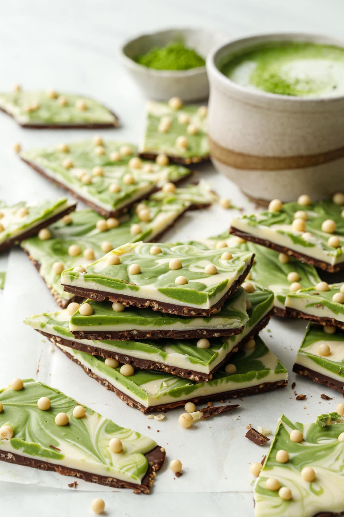 Close-up shot of a slice of Matcha Pear Crisp with White Chocolate Chips, showing the layers of pears, white chocolate, and crispy topping