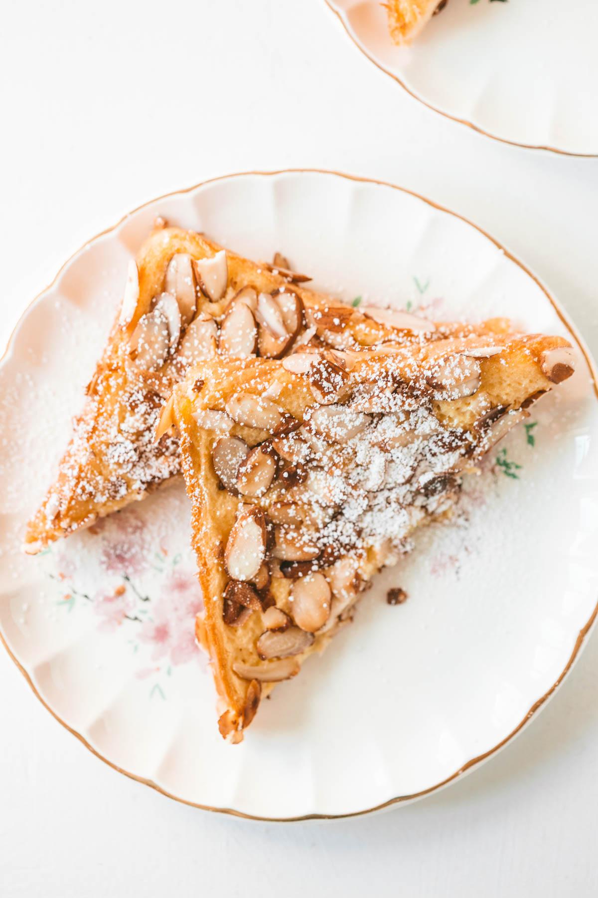 almond french toast casserole with sliced almonds on top