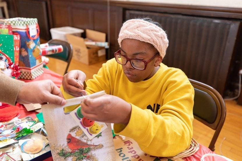 person creating diy gifts