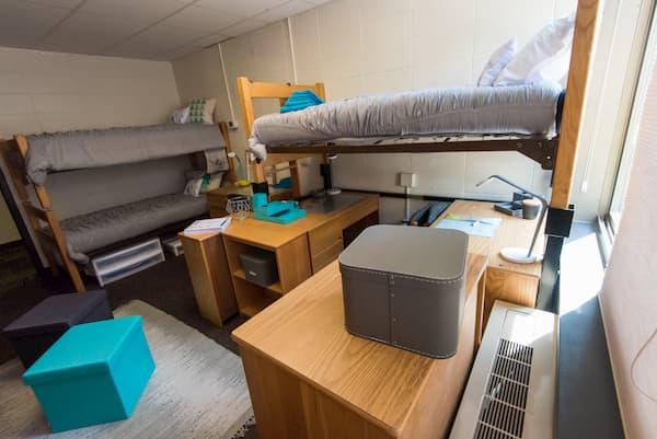 Three different dorm chairs in a dorm room setting