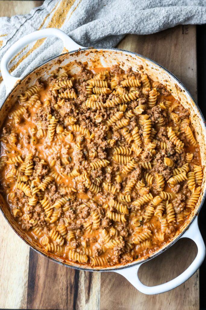close-up of ranch beef pasta being stirred in a pan