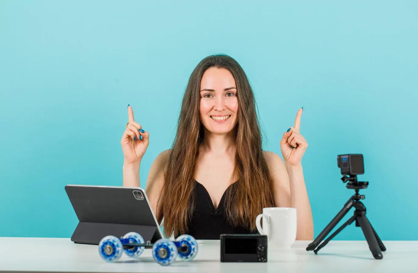 woman thoughtfully watching youtube on a laptop, considering data privacy