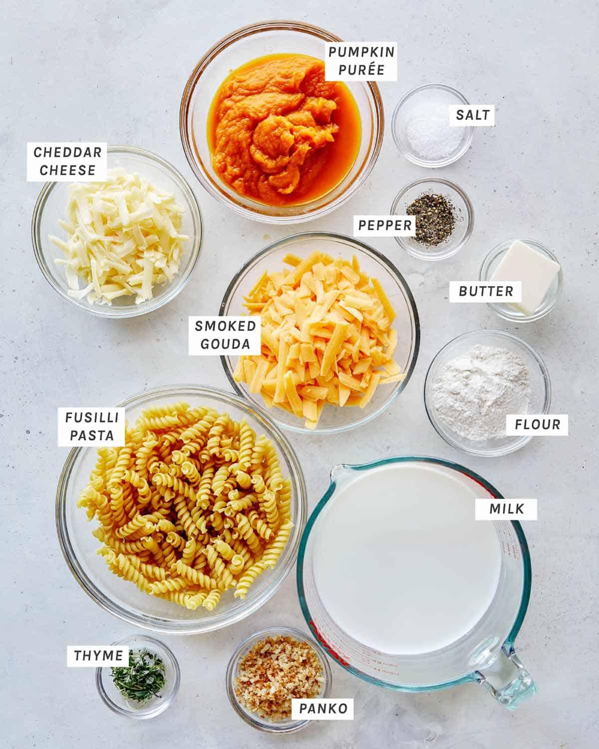 ingredients for mac and cheese laid out on a kitchen counter