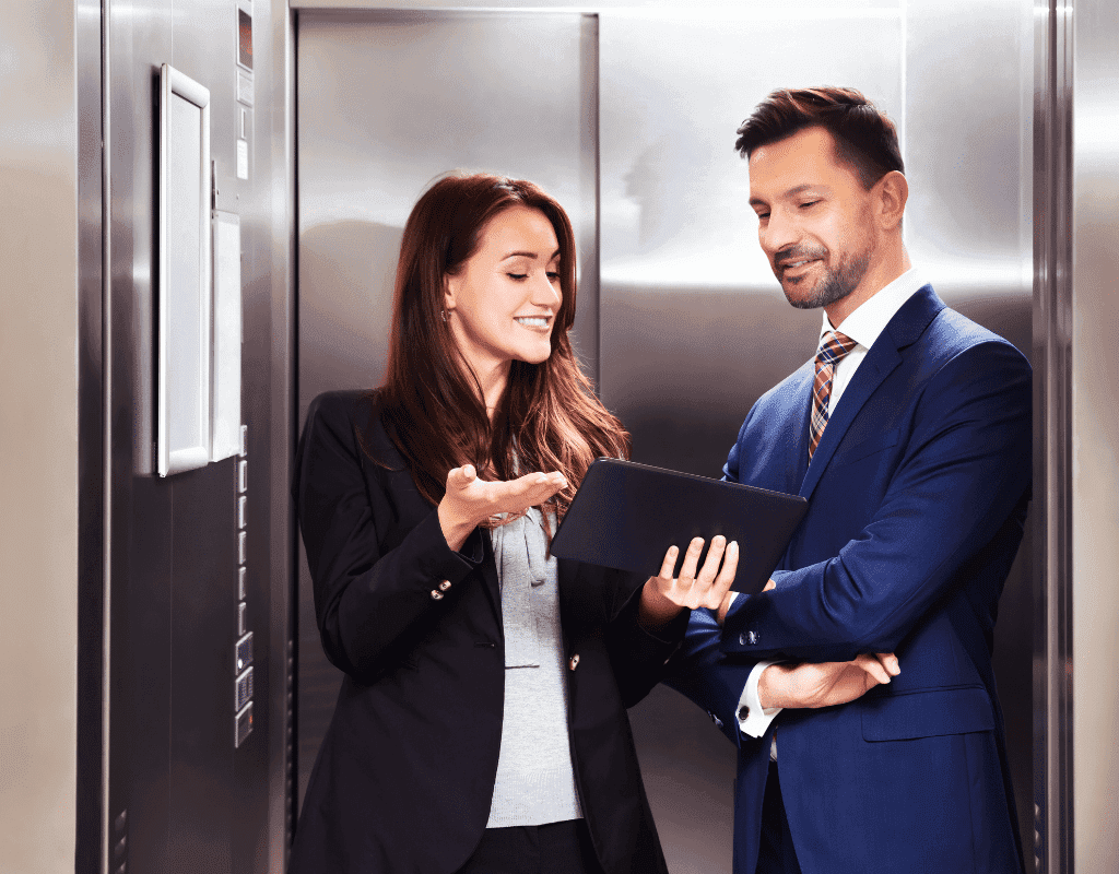 student practicing elevator pitch in front of a mirror