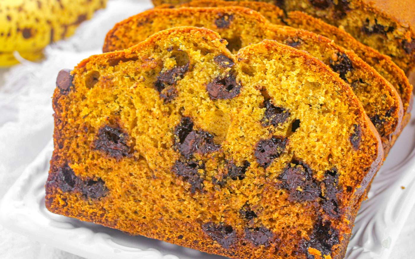 close-up shot of a slice of pumpkin bread with visible moist texture