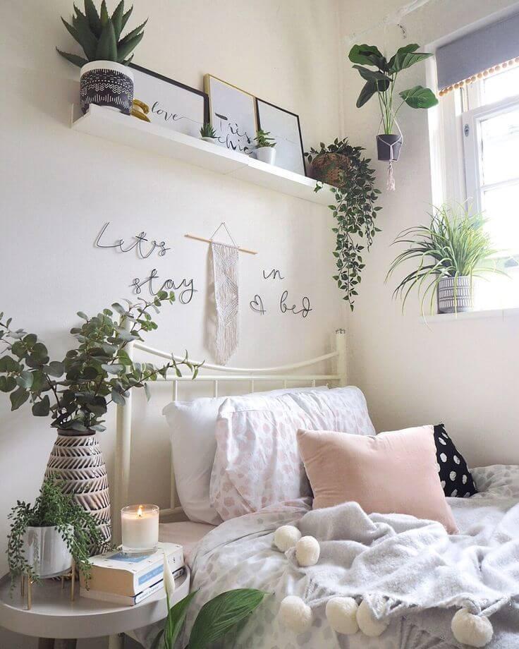 dorm room decorated with plants and calming elements