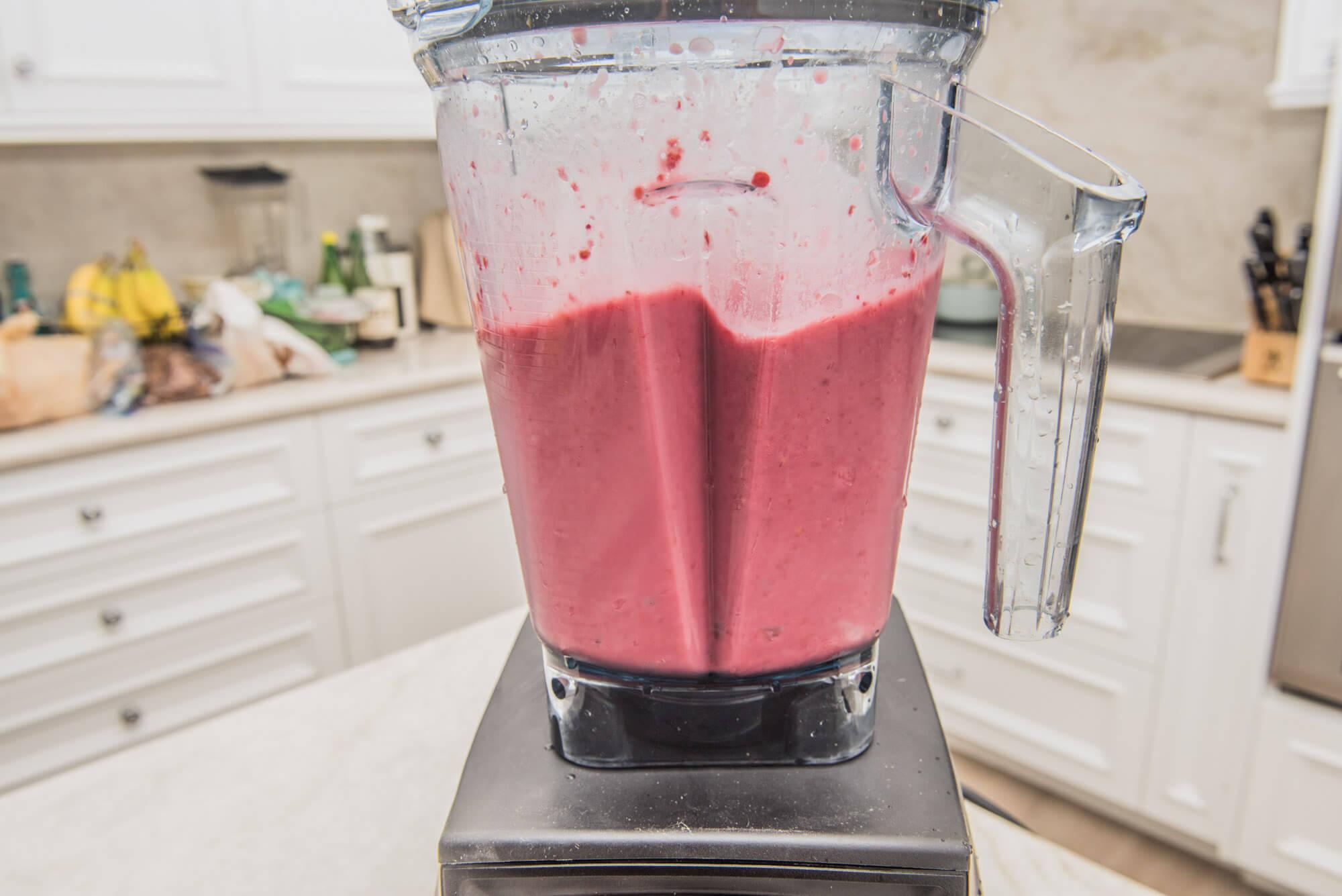 close-up of a blender making a hurricane protein smoothie