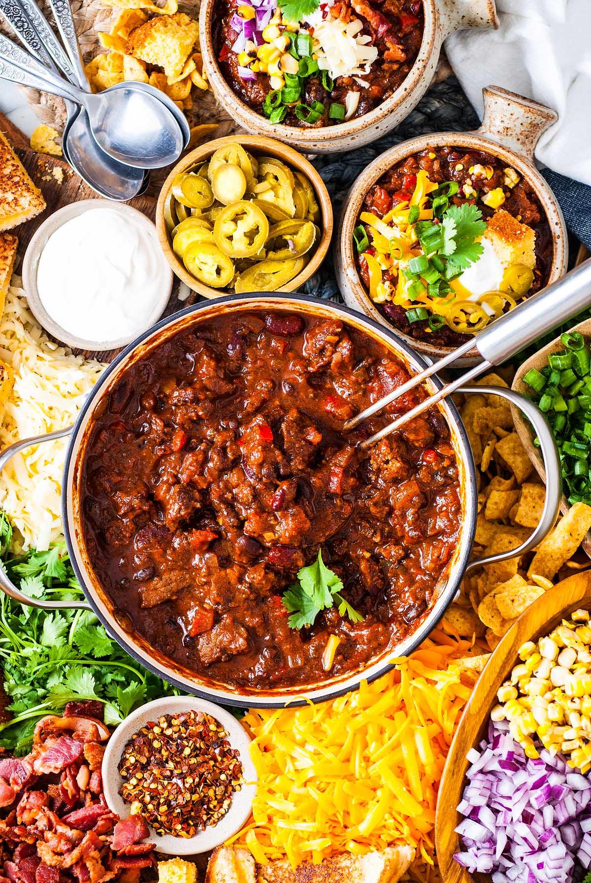 family gathered around a table enjoying a hearty chili-pepper beef roast dinner