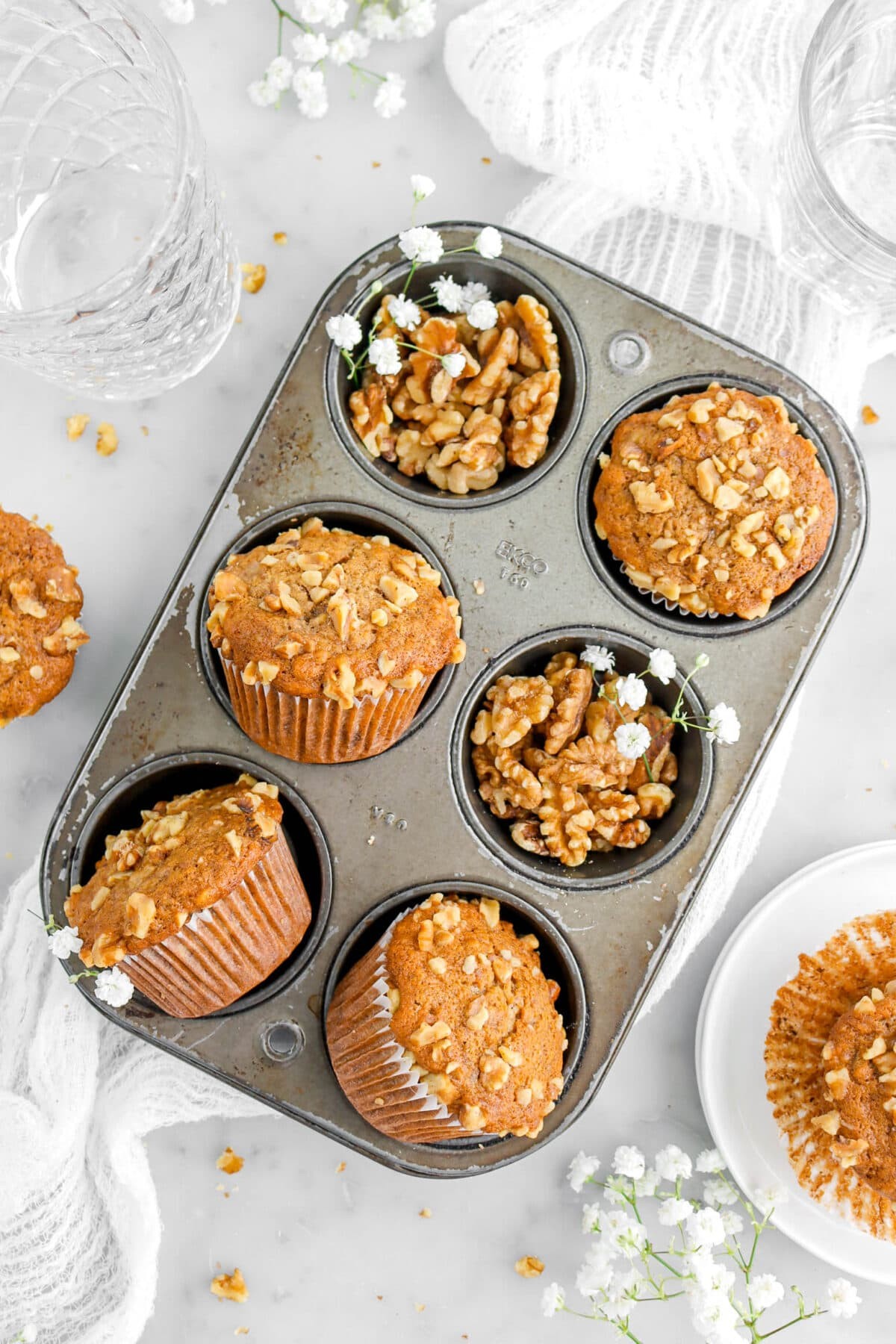 overhead shot of freshly baked clean eating banana nut muffins