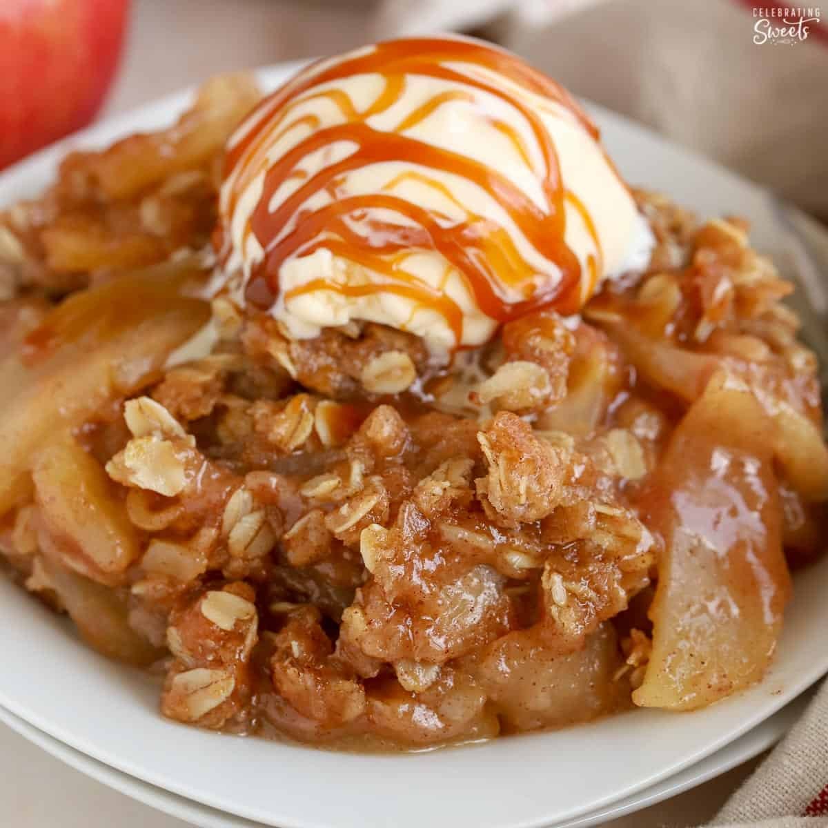 golden brown apple crisp with a scoop of vanilla ice cream