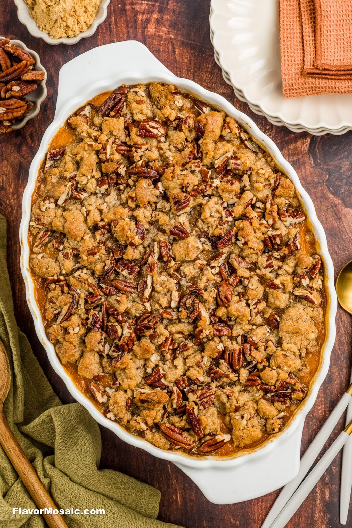 sweet potato casserole with golden caramelized pecan topping, holiday setting