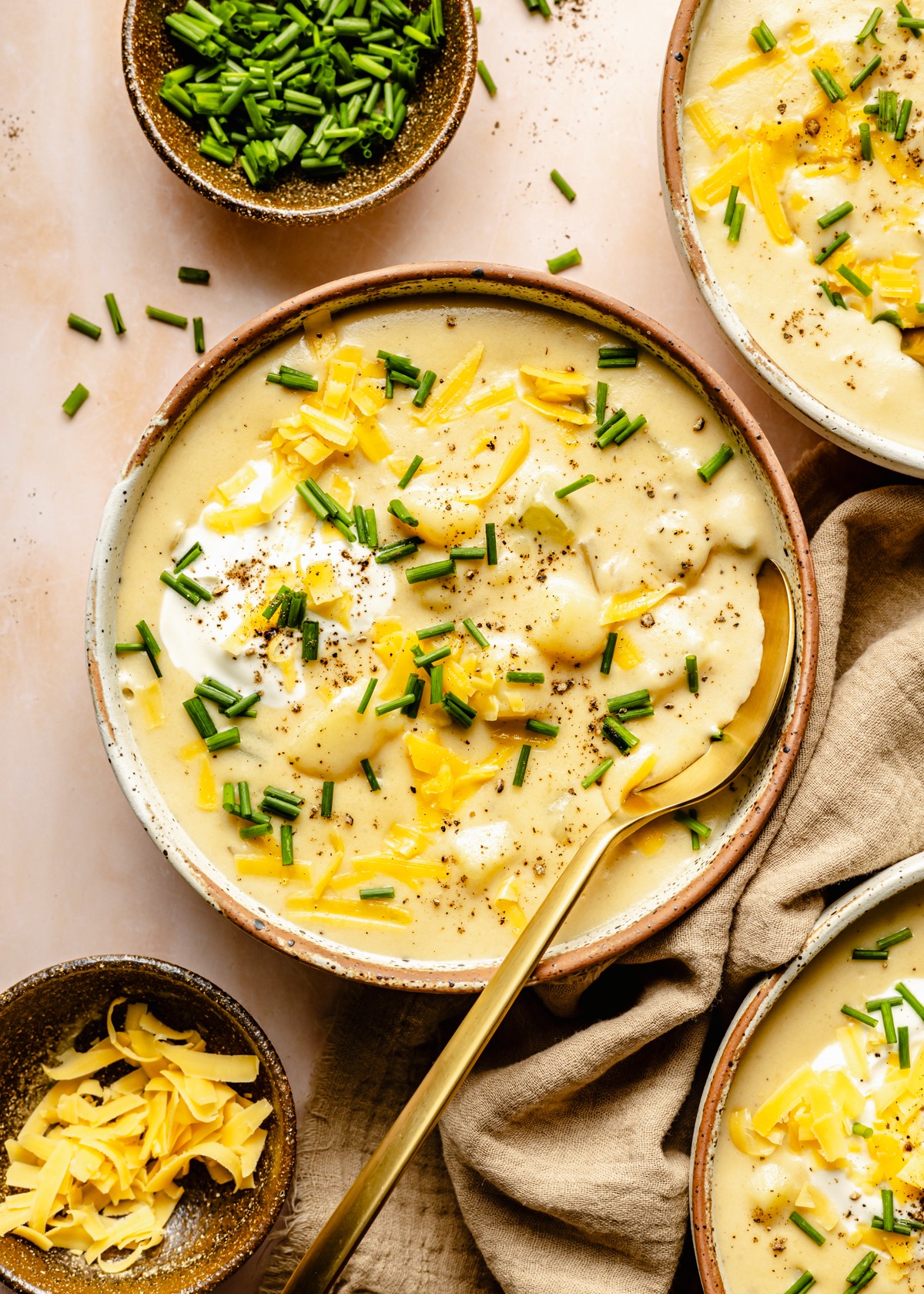 bowl of creamy potato soup with chives