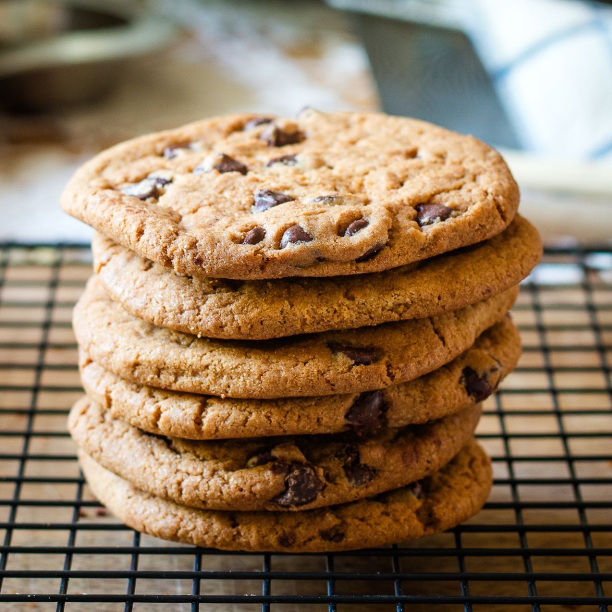 golden brown chocolate chip cookies on a cooling rack