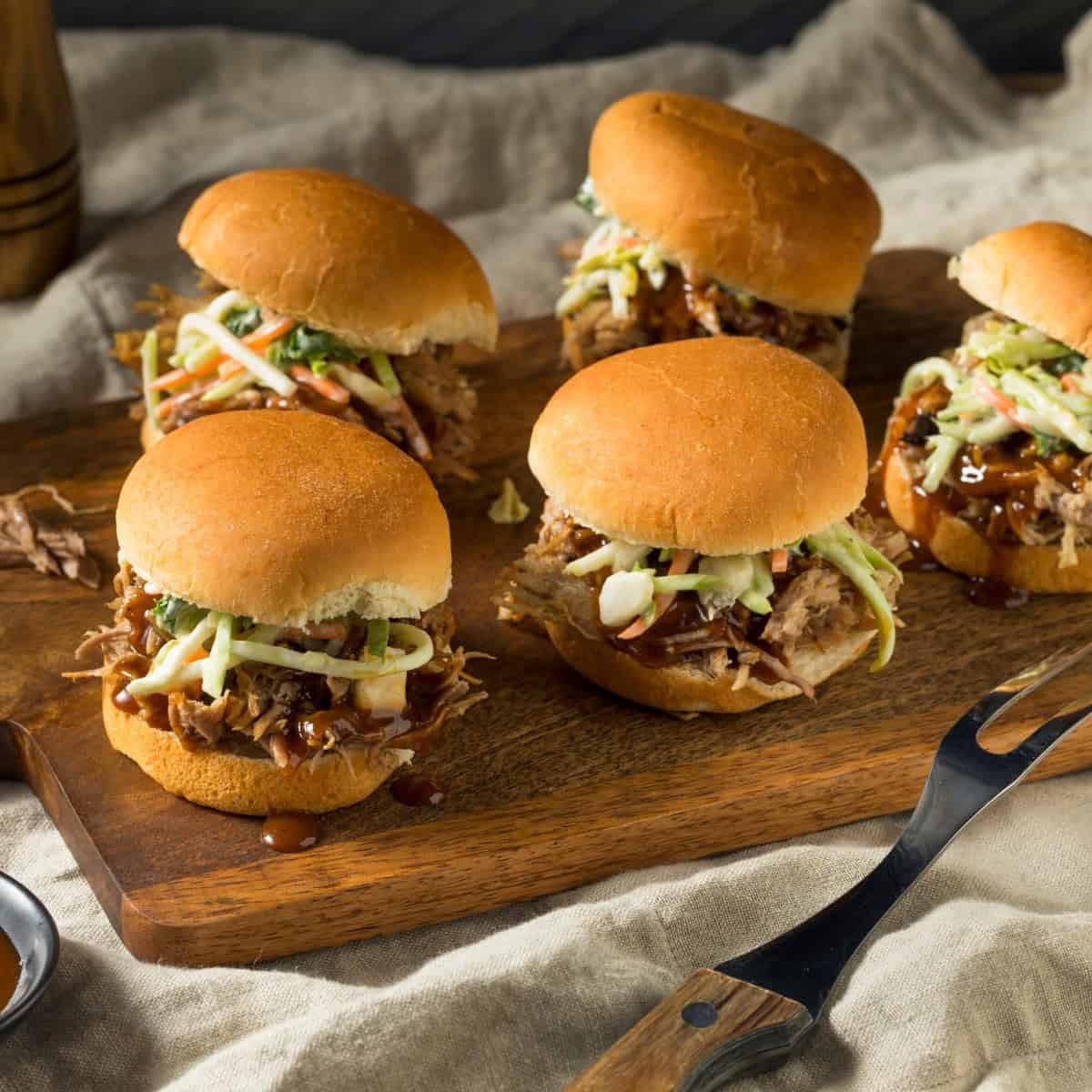 Espresso Rubbed BBQ Pork Sliders on a wooden board