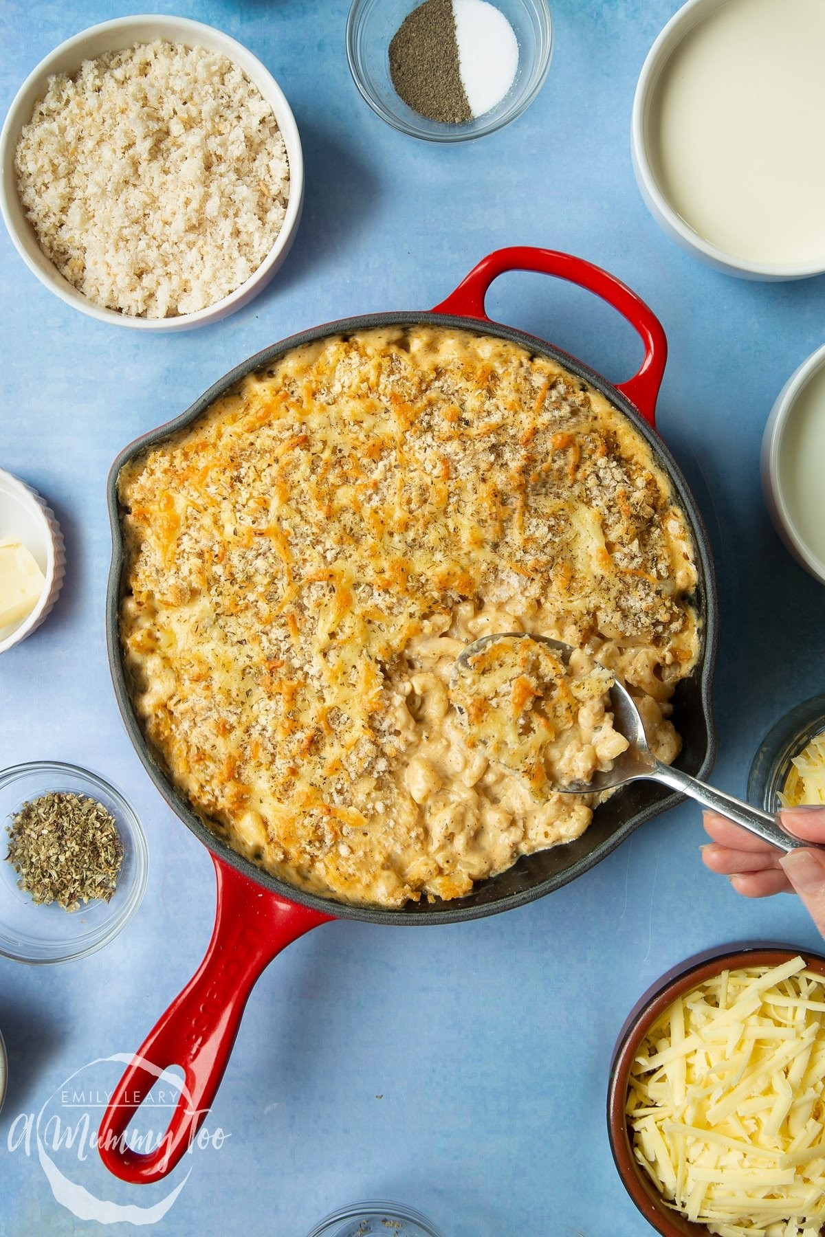 creamy roasted garlic and herb mac and cheese in a baking dish