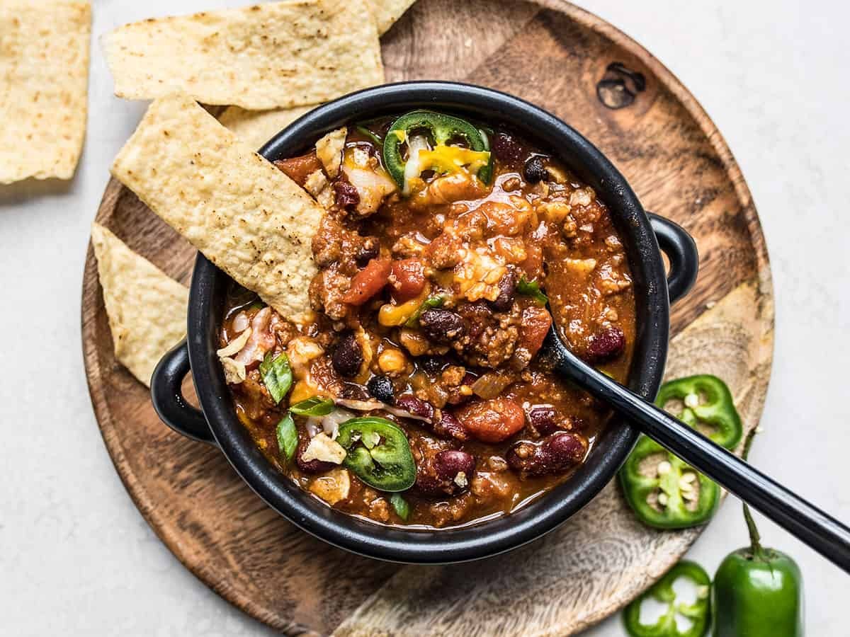 bowl of homemade chili with toppings