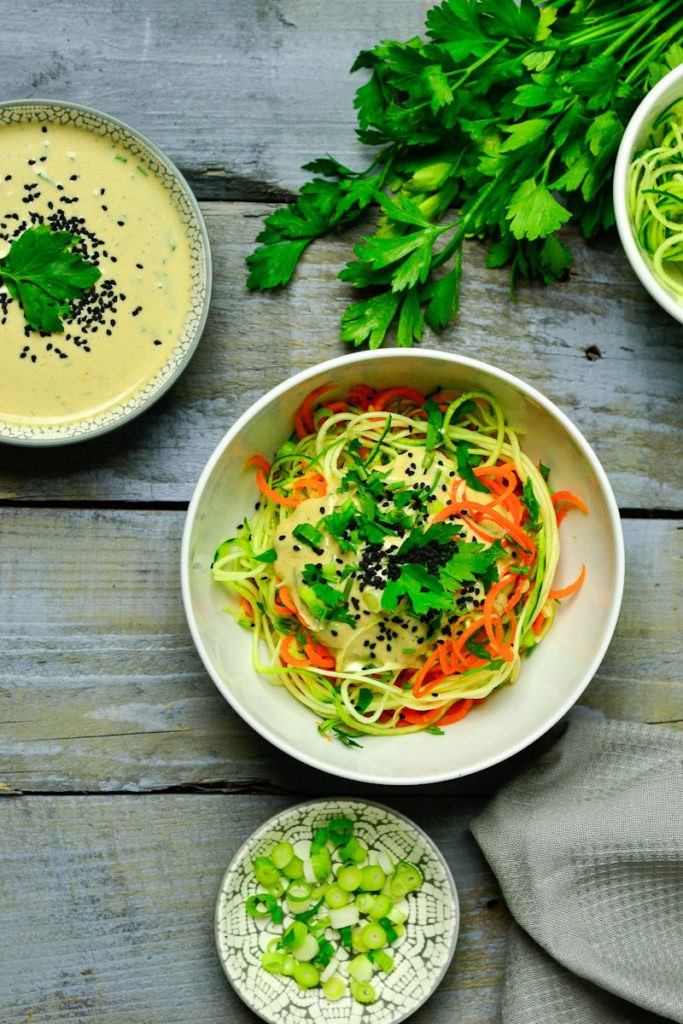 zucchini noodle bowl with sesame tahini dressing