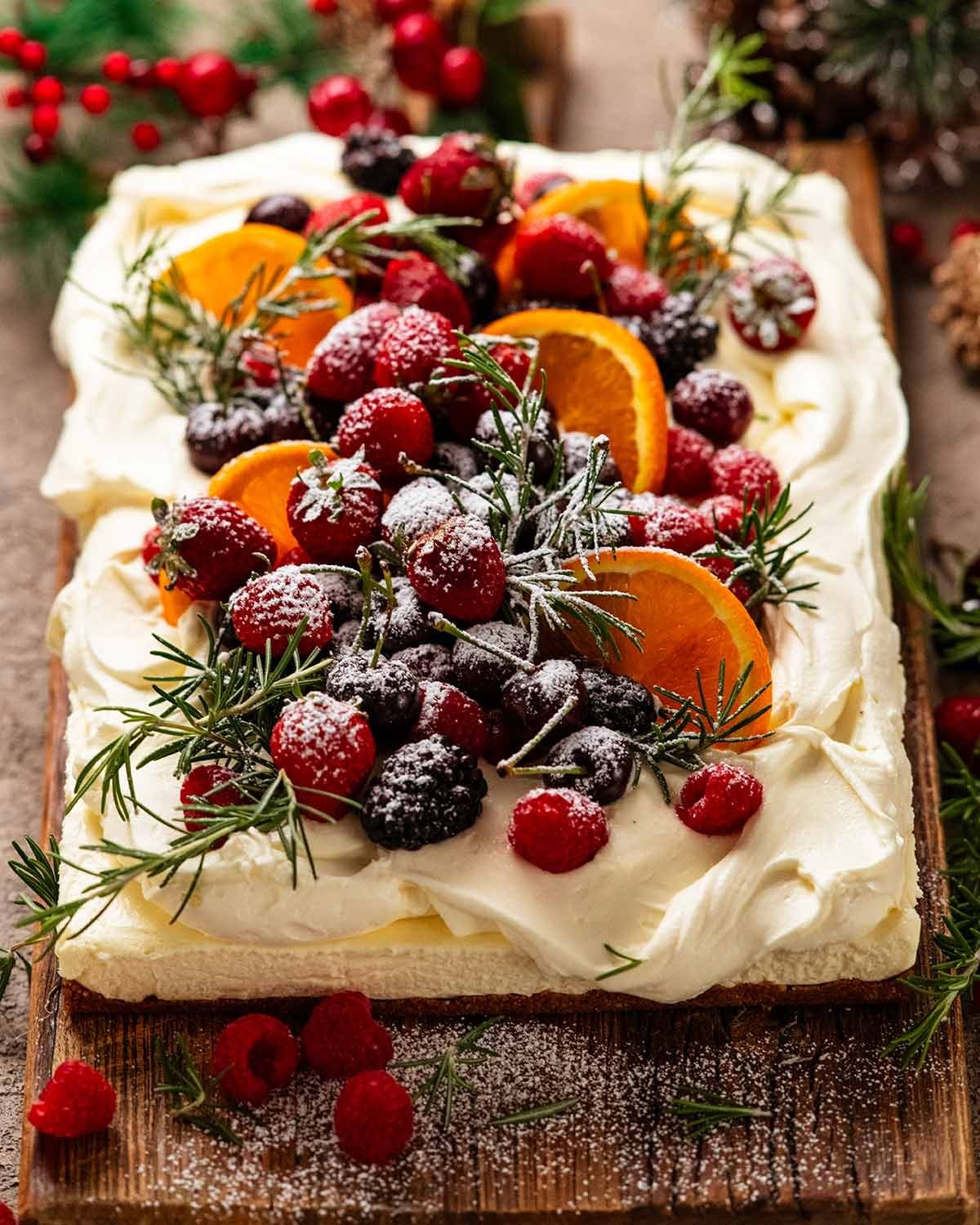 Festive caramel cheesecake with holiday decorations, a slice cut out