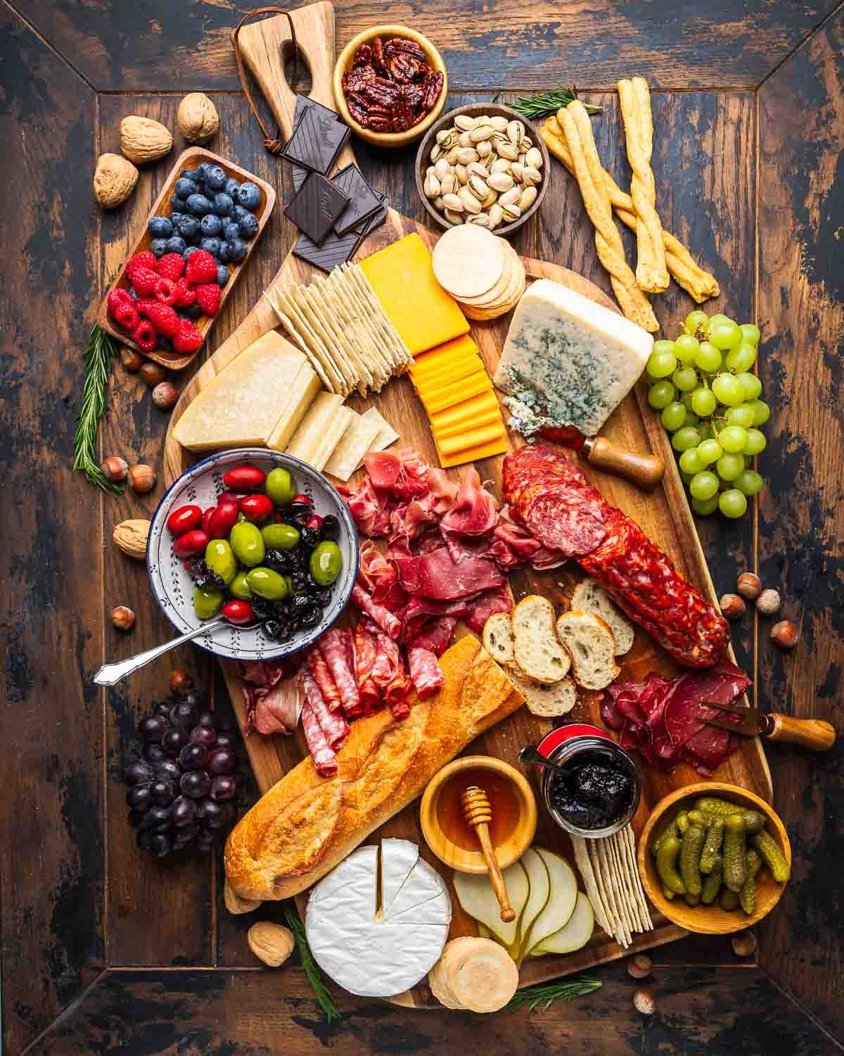 overhead shot of a beautifully arranged Friendsgiving charcuterie board