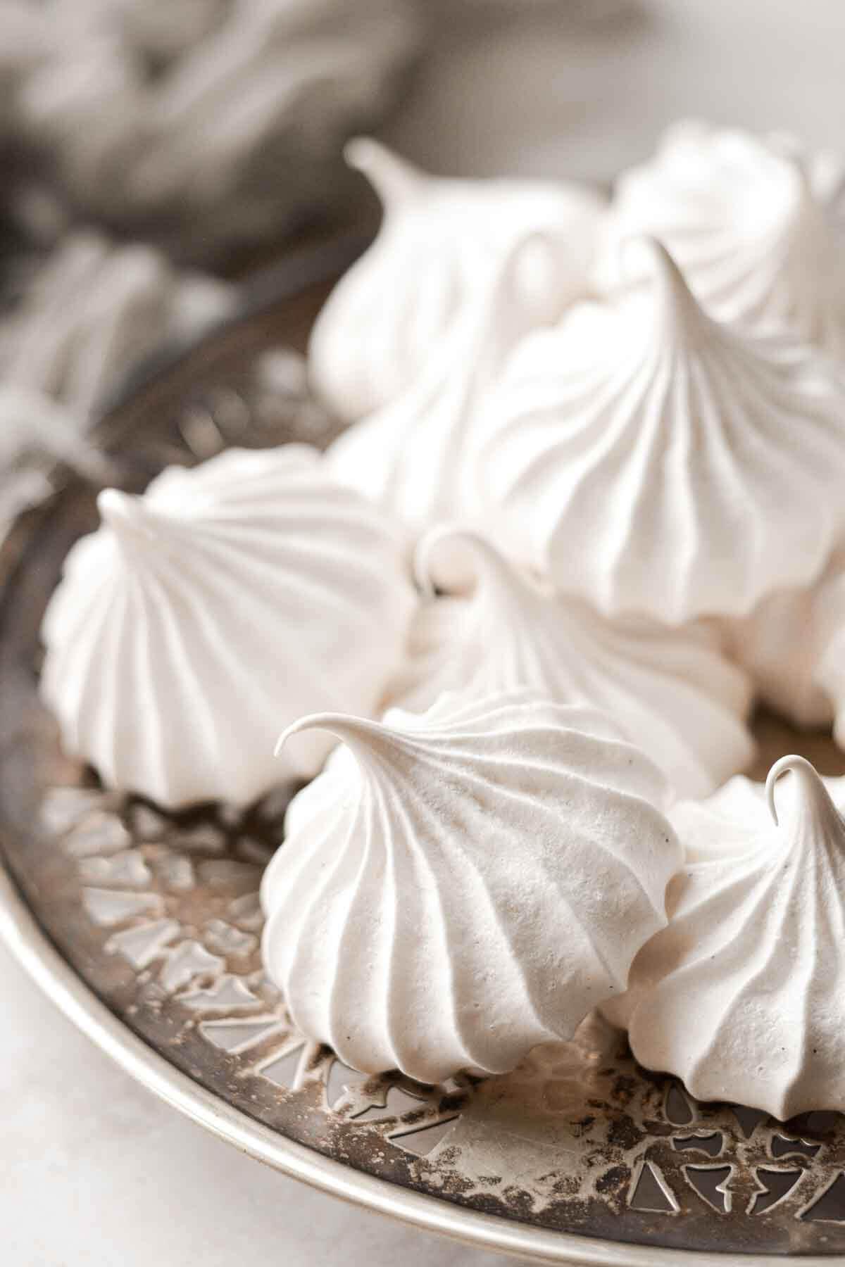 close up of vanilla bean gluten-free meringue cookies