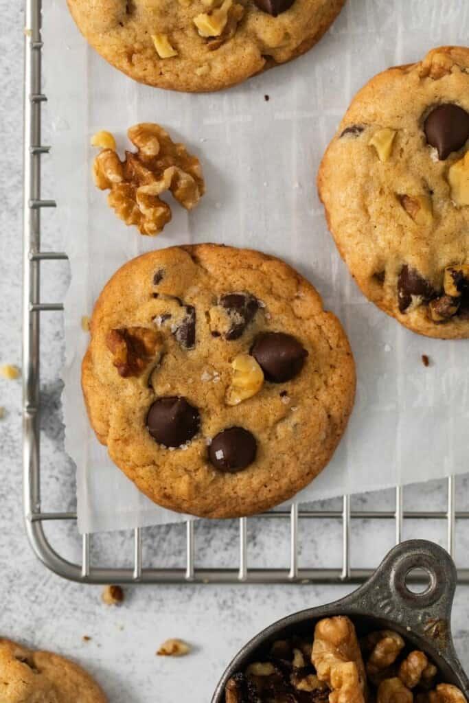 baked blue cheese walnut chocolate chip cookies on a cooling rack