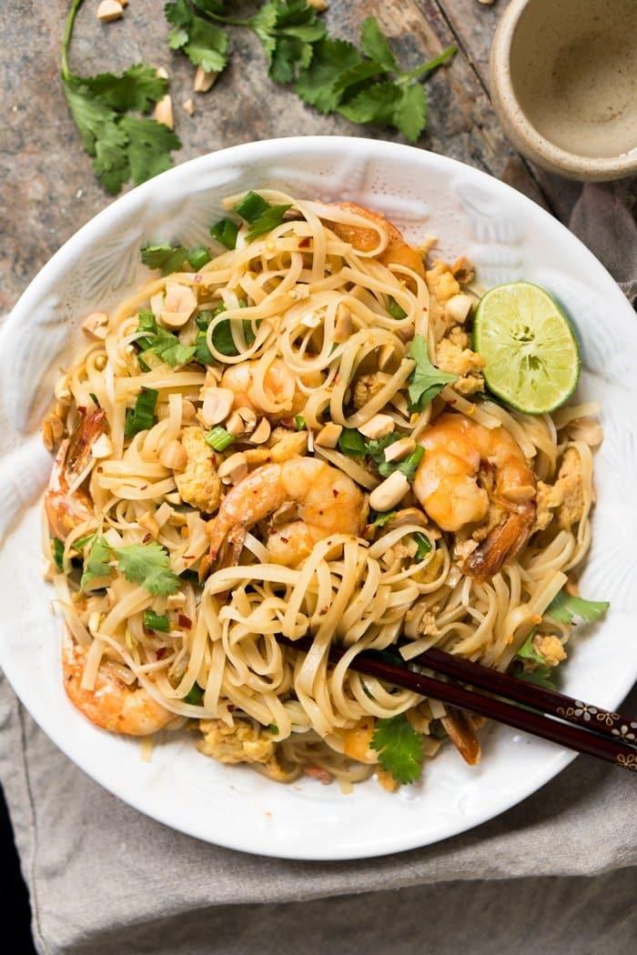 low carb zucchini noodle pad thai with shirataki noodles in a bowl