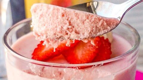 close up of a spoonful of strawberry sparkle magic mousse
